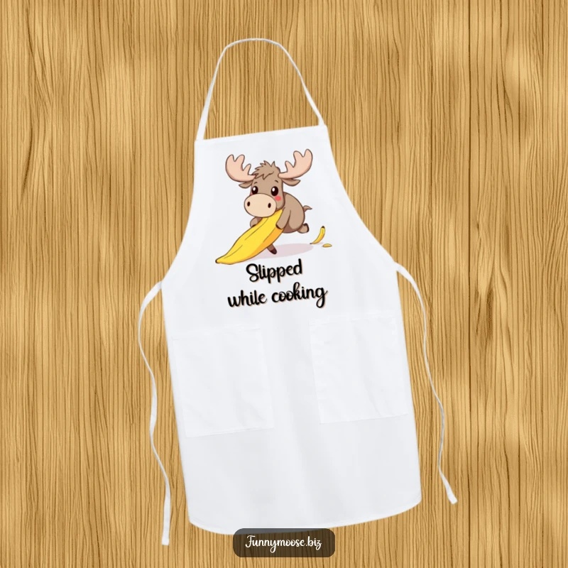 Funny apron showing a clumsy kawaii moose comically tripping on a banana peel, its face a picture of adorable, surprised chaos.