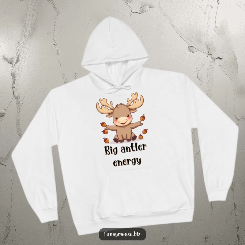 Funny kawaii moose wearing large antlers and juggling acorns, featured on a warm and cozy hoodie.