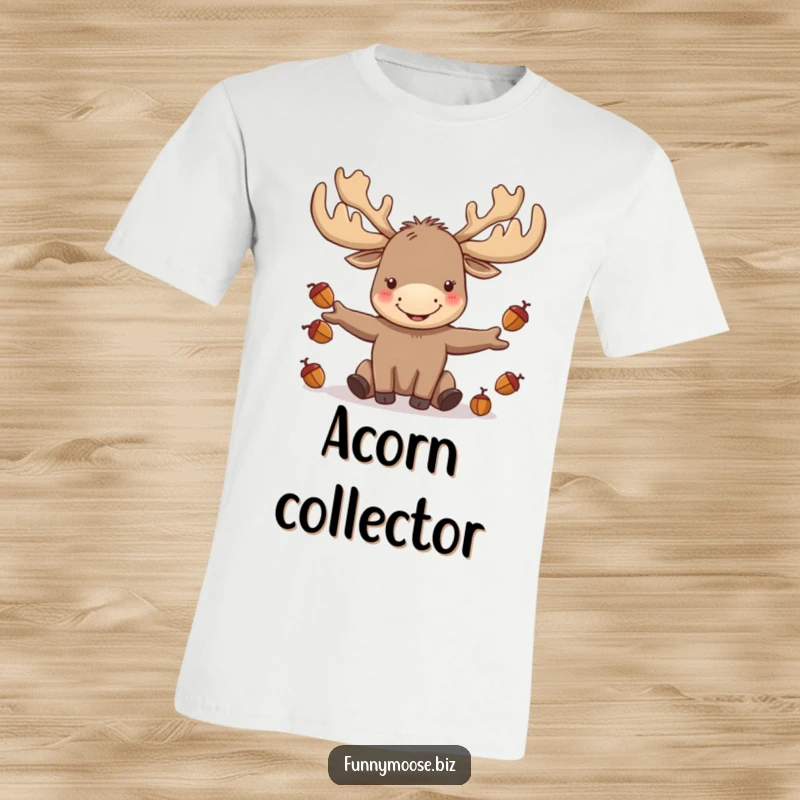 Funny kawaii moose with oversized antlers joyfully juggling acorns, printed on a comfortable t-shirt with a cheerful look.