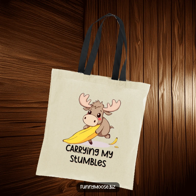 Funny tote bag featuring a cute kawaii moose comically tripping over a banana peel, its eyes wide with a surprised, endearing expression.